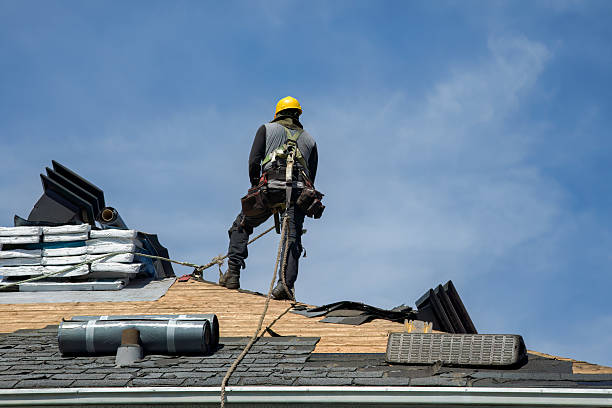Professional Roof Replacement technician working in Welsh, LA